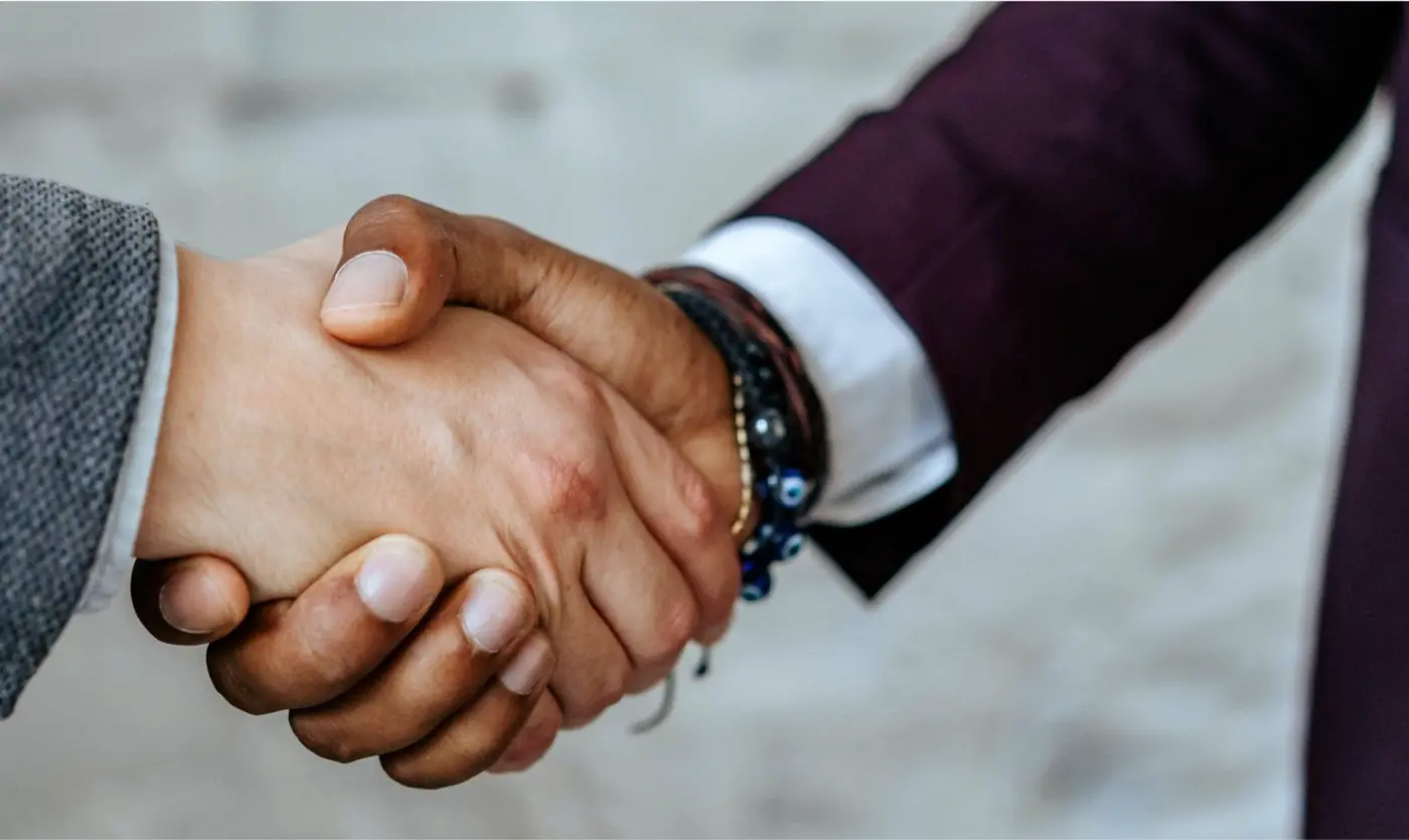 Handshake sealing a trusted business partnership
